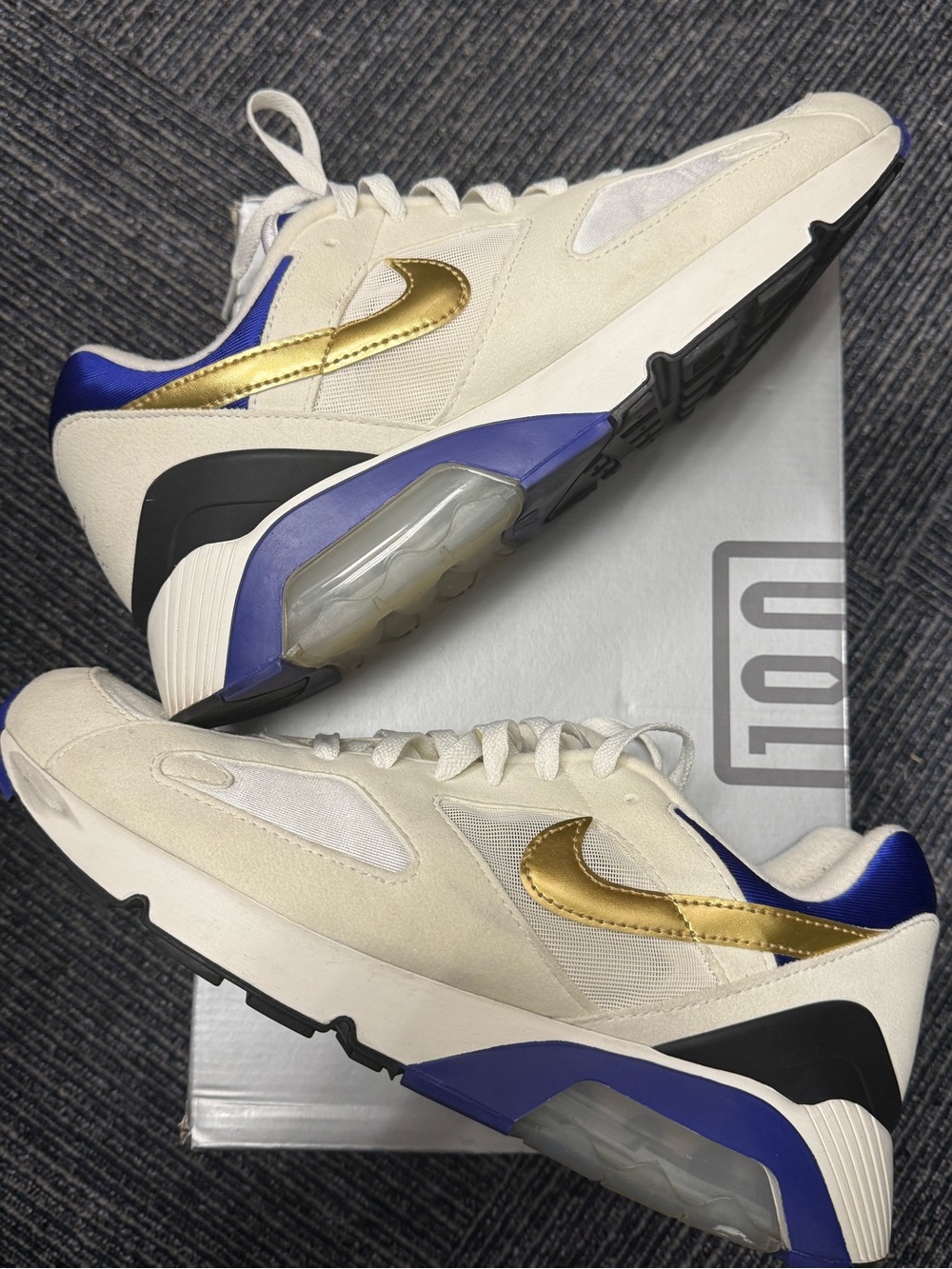 Nike Cream & Gold Retro Running Sneakers with Blue Accents